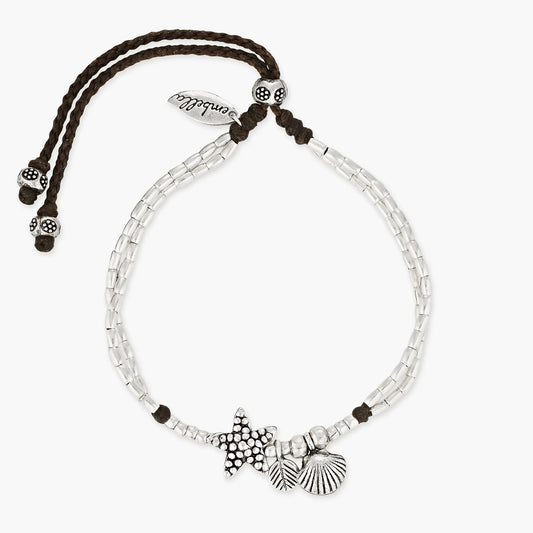 Discover our Marine Treasures Adjustable Anklet, a stunning accessory that captures the essence of the ocean. Handcrafted with care, it features Hilltribe Silver charms, including a clam shell, starfish, and fern, symbolizing the beauty of marine life. The adjustable design ensures a perfect fit, and the durable materials guarantee long-lasting beauty. Embrace the spirit of the sea with this exquisite anklet.

Once you have fitted your anklet so it fits comfortably, tie a knot to ensure it stays safe and se