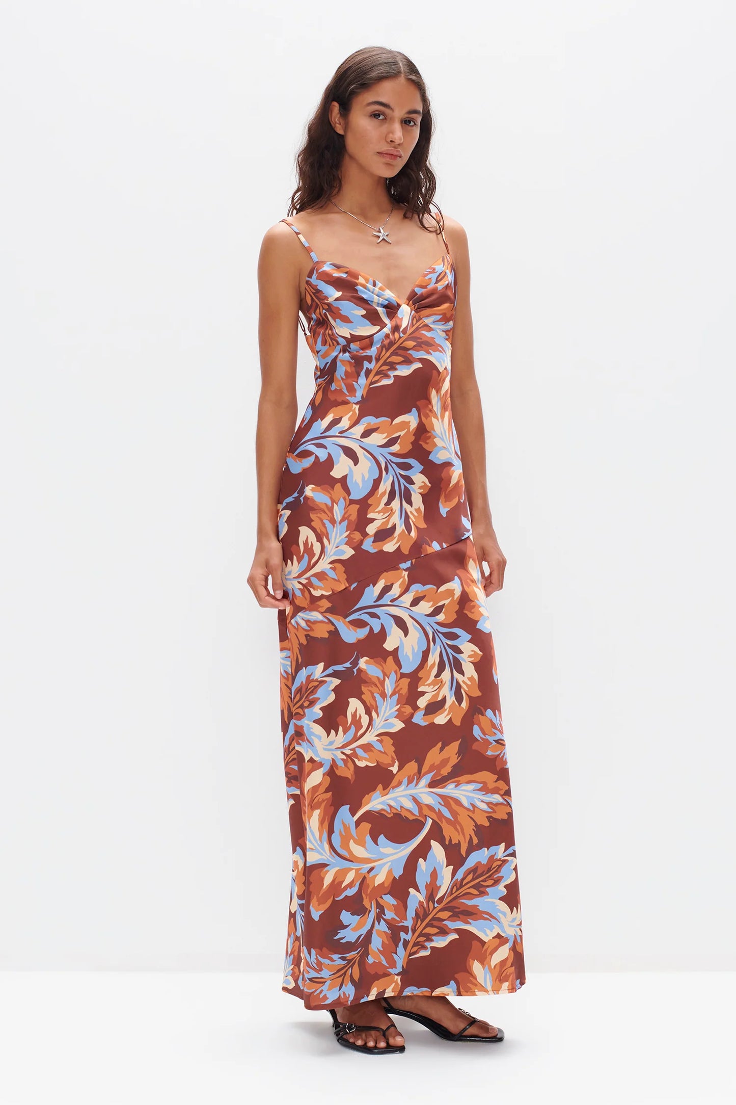 The Flora Dress by OWNLEY is one of the most flattering maxi's to date! The dress features gathered bust cups, adjustable shoulder straps and back strap detail, asymmetric seam to create the most flattering shape on the body. In the stunning Retro Leaf print, you can't go past this beautiful dress.
