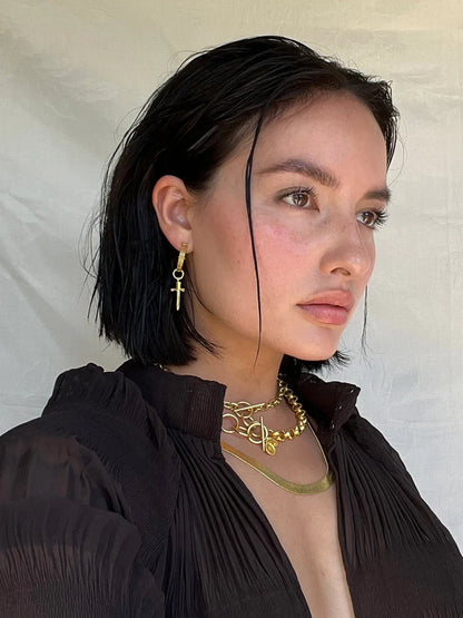 Our&nbsp;bestselling&nbsp;Dagger Mini Hoop&nbsp;Earrings&nbsp;are a&nbsp;little hoop moment that our MM Women absolutely adore!&nbsp; We all love a baby hoop and these goldies are no exception. They easily dress up any outfit, especially with the addition of our gorgeous charms, or they are perfect on their own. To be honest, we have been known to wear these for most occasions, including walking the dog and going to pilates. They really are your everyday earring bestie!&nbsp;