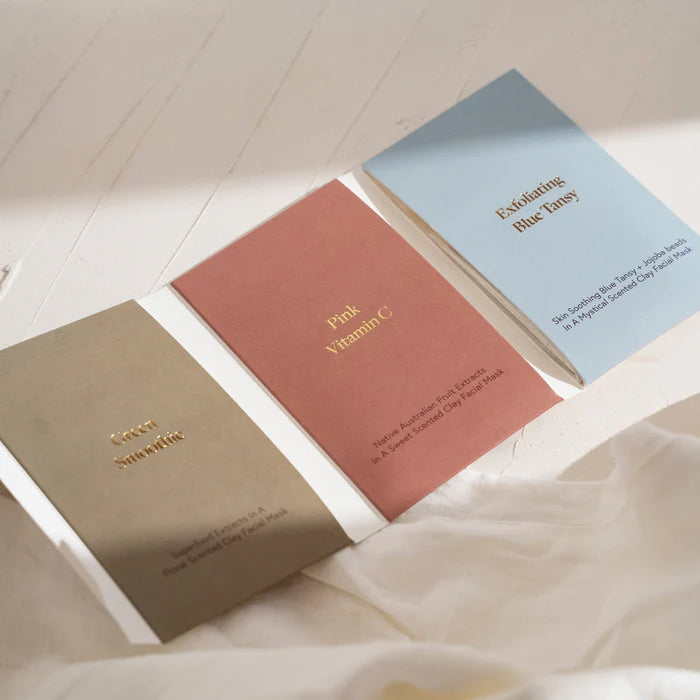 Discover radiant skin with our Australian-made Face Mask Discovery Set, featuring three natural clay masks—Pink Vitamin C for brightening, Blue Tansy for gentle exfoliationg and sensitive skin soothing, and Green Smoothie for detoxifying. Thoughtfully crafted with premium botanical ingredients, each mask offers a unique mindful self-care ritual to nourish and transform. Beautifully presented in sustainable recyclable pouches and compostable cellos, this luxury skincare set is perfect as a thoughtful wellnes