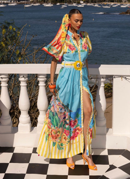 Bright, bold, and full of summer charm — the Positano Maxi Dress in Lemon is designed to turn heads. Crafted from a lightweight linen-blend fabric, this dress features a flattering gathered waist with a hidden elastic and a wide statement belt with a lemon-rattan buckle. The mandarin collar and stripe-contrast hemline add a playful touch, while the balloon sleeves and cotton lining ensure comfort and breathability. Perfect for Event / Race Wear, or Long Lunches.  