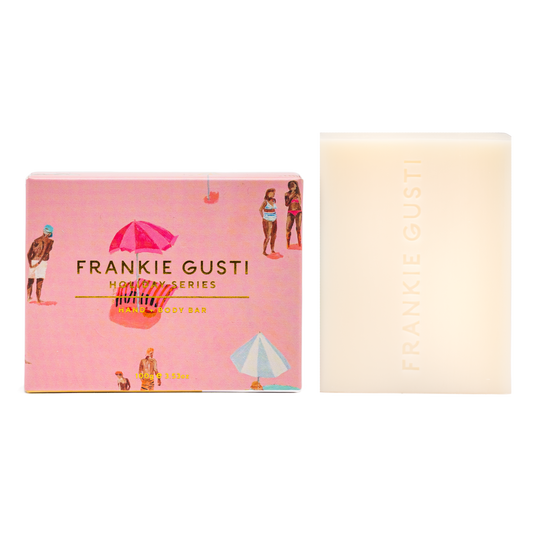Bring the sunshine to your daily routine with the Holiday Series Hand + Body Bar in Passionfruit Spritz by Frankie Gusti. Bursting with tropical sweetness, this refreshing blend of zesty passionfruit, ripe guava, and a hint of grapefruit fizz will leave your skin clean, soft, and beautifully scented — like a summer cocktail by the pool.