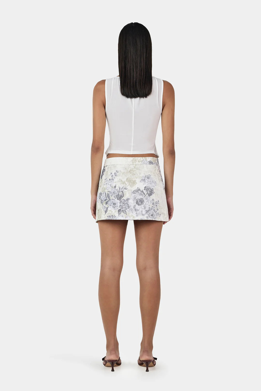 The Honey Corset Top features a contrast design with mesh panels covering the back and shoulders. Front princess seams allow for a flattering shape, while hook-and-eye closures allow the top to be worn fully fastened or slightly open.

- Corset top with mesh contrast back
- Printed design
- Hook and eye closure at front
- Front neckline is a channel with rouleau threaded through
- Front princess seams