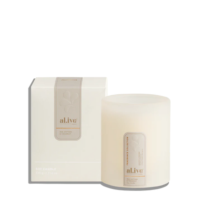 al.ive body - A calming Soy Candle blending powdery cotton flower with ocean air and delicate florals. Soft coconut and sandalwood create a serene atmosphere that evokes clean linens drying in a sea breeze.