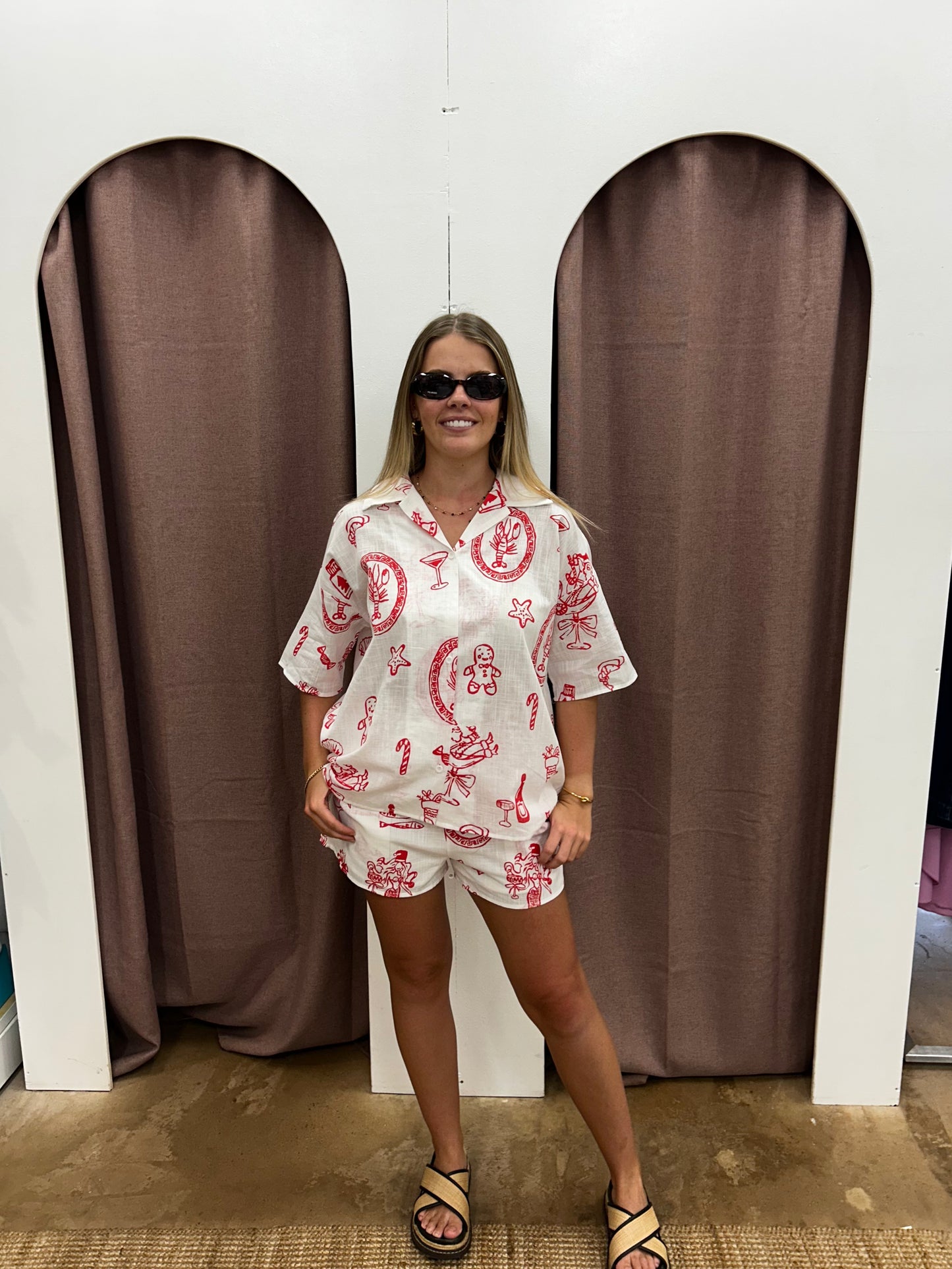 Get ready for the holiday season with our White Santa Print Shirt/Shirt Set! Made from high-quality cotton, this festive set features a white and red print of Santa, adding a touch of holiday cheer to your wardrobe. Perfect for all your holiday gatherings and events, this set is both comfortable and stylish. Don't miss out on this must-have for the holidays!