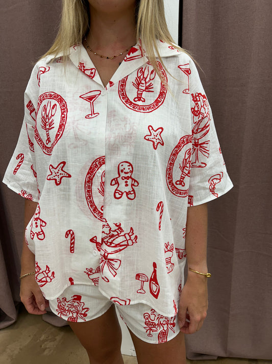 Get ready for the holiday season with our White Santa Print Shirt/Shirt Set! Made from high-quality cotton, this festive set features a white and red print of Santa, adding a touch of holiday cheer to your wardrobe. Perfect for all your holiday gatherings and events, this set is both comfortable and stylish. Don't miss out on this must-have for the holidays!
