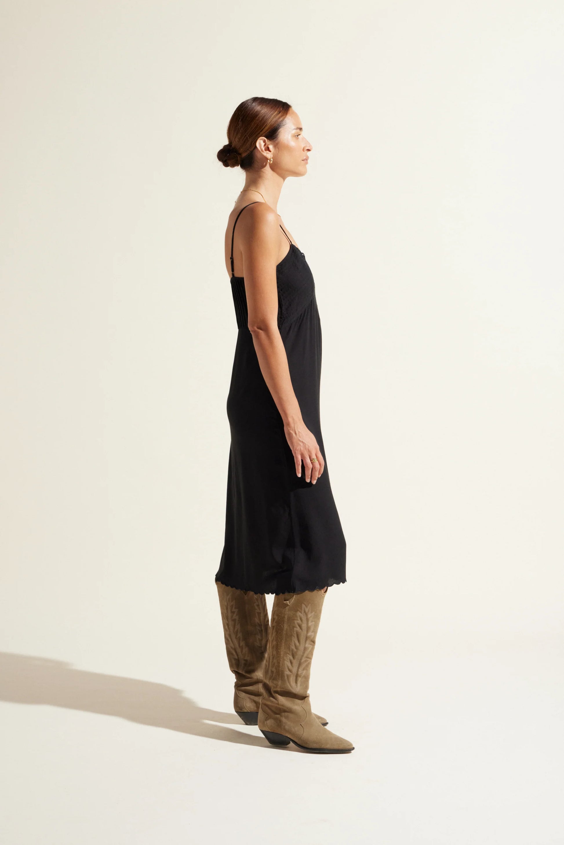 An easy to wear throw on midi dress versatile for day or night.