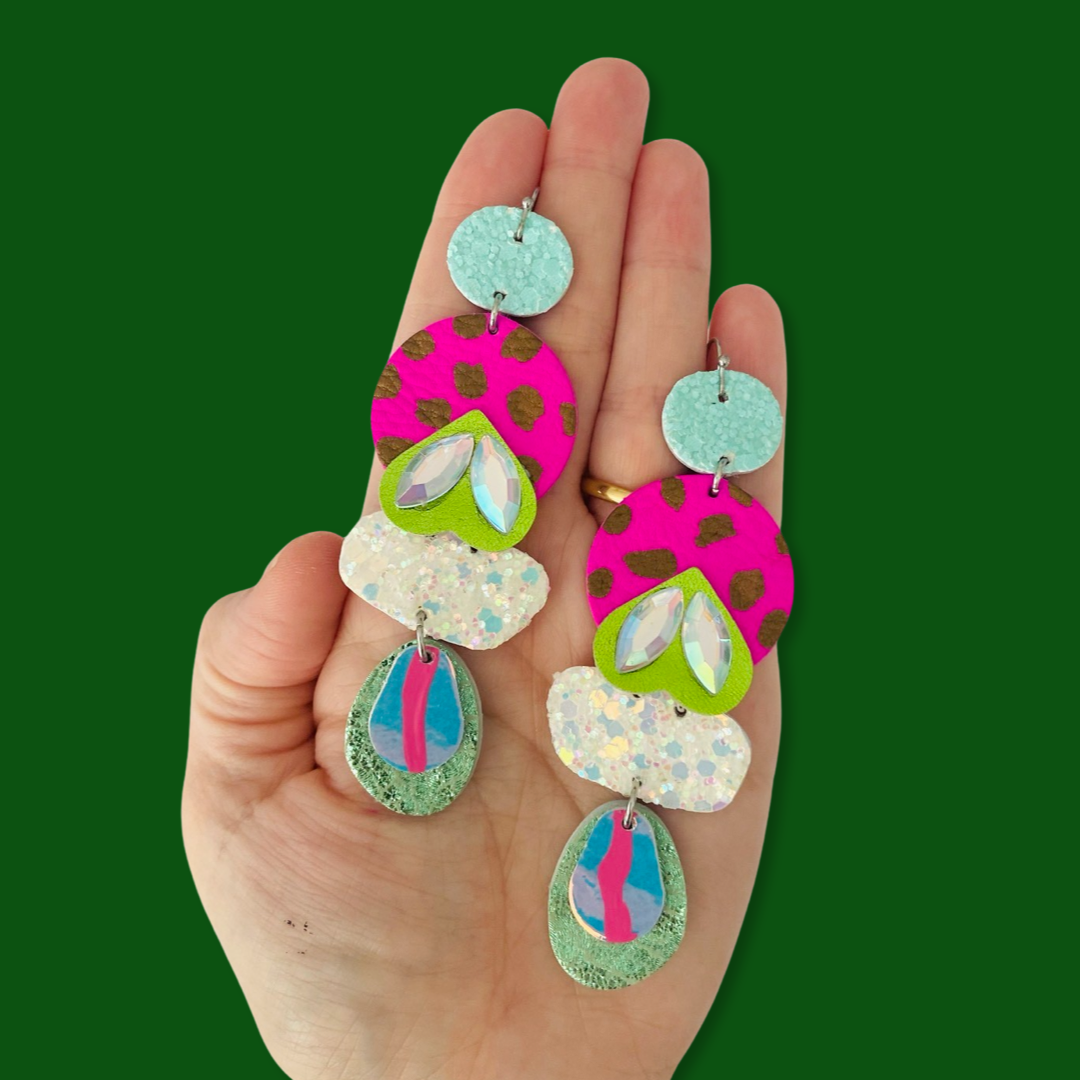 A striking pair of vibrant pink, pastel mint, iridescent pearl and warm bronze handmade leather earrings. 