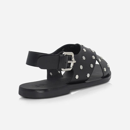 The Kyra sandal takes the classic slide shape and elevates it with a gladiator style leather strap. Finished with signature Sol Sana studded hardware and a high quality buckle fastener.