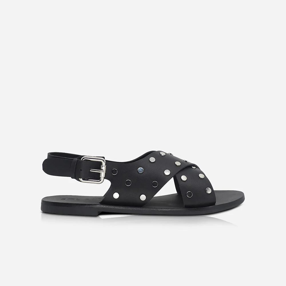 The Kyra sandal takes the classic slide shape and elevates it with a gladiator style leather strap. Finished with signature Sol Sana studded hardware and a high quality buckle fastener.