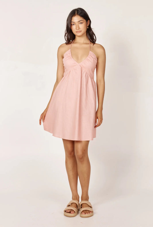 Introducing our elegant Cassia Mini Dress in Blush. Designed with thin straps and a V-neck for a chic look. The pop of colour adds a touch of fun, perfect for brunch with the girls! 