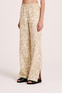 The Soraya Pant is made from a linen cotton blend in our exclusive Aloe print. The silhouette is a relaxed straight leg and finishes at full length. Features include an encased elasticated waistband, side &amp; back pockets, and side slits at the hem.