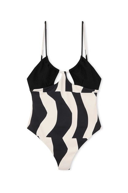 The Splice Contrast One Piece by Zulu & Zephyr is a standout monochrome style with contrasting textures, a soft unpadded bust, adjustable shoulder straps which feed through to the front offering an adjustable fit, a scoop back, and moderate rear coverage.