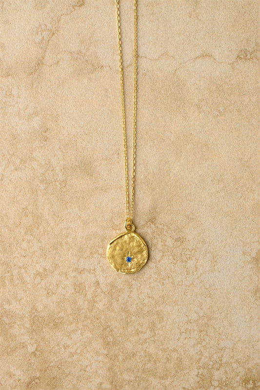 Get starstruck with Sarina! This stunning pendant features a blue sapphire in a unique star shape that will surely steal your heart. Keep it close as a one-of-a-kind keepsake.

925 Gold Plated Sterling Silver&nbsp;
Sapphire Stones
Lead,Nickel &amp; Tarnish Free
Hypoallergenic
Waterproof

Dimensions

Length | 40 + 2.5 + 2.5cm

Pendant Diameter | 16mm