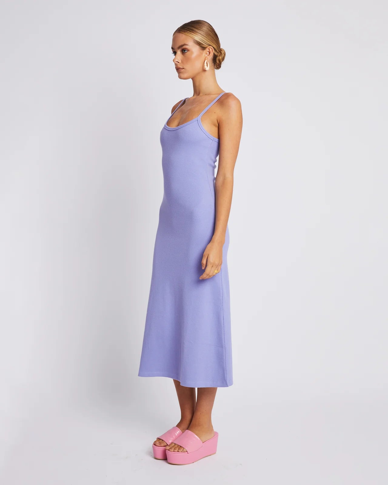 Look cool and feel comfortable in this A Line Midi Dress. With its thick ribbed cotton, it's form shaping, while keeping you comfortable. The midi length makes it perfect for any occasion. Get ready to look great in lilac.