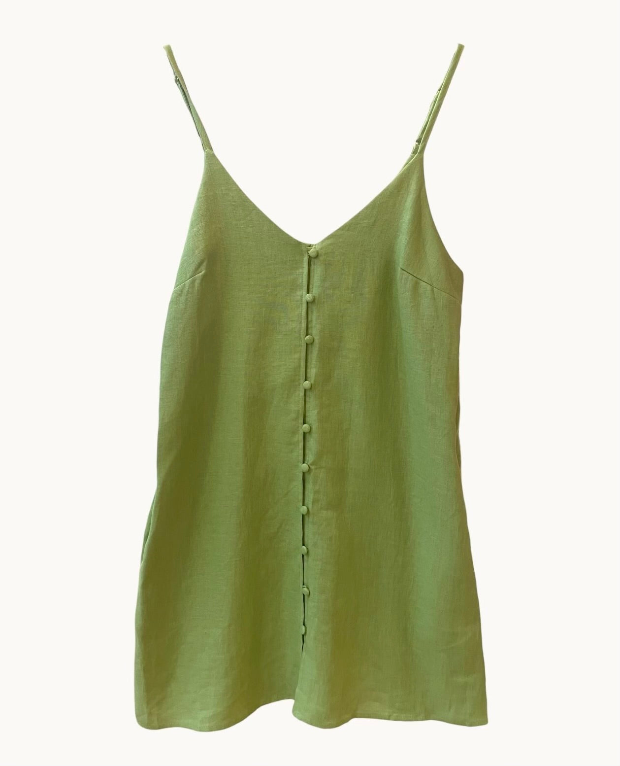 Expertly designed by Little Lies, the Reagan Dress in green is a must-have addition to any wardrobe. This stylish dress boasts a timeless design, made from high-quality materials for maximum comfort and durability. Perfect for any occasion, the Reagan Dress is sure to impress with its elegant and versatile style.