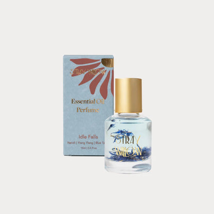 Idle Falls is an Australian-made natural perfume roller created to bring a sense of tranquility and calm. This serene aromatherapy blend features uplifting Grapefruit and Bergamot, floral notes of Ylang Ylang and Neroli, and the soothing presence of Blue Tansy and soft Vanilla. Housed in a sustainable recyclable glass roller bottle, it's crafted with natural botanical ingredients and pure essential oils—offering a gentle, grounding scent to support mindful self-care moments, clarity, and emotional ease. The