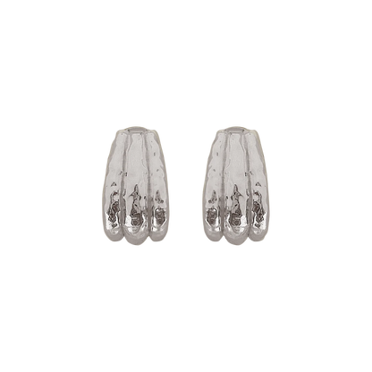 Okay let’s talk about the Jones Earring! Oh so fabulous and effortlessly chic. A silver chunky huggie style that hugs the ear with finesse and features our signature hammered texturing. The Jones is a classic shape and perfectly flows from day to night, paired with your favourite tee and denim, a suit set or summer florals, understated yet bold, she is versatile to say the least. Inspired by the power woman who can do it all. The Jones Earrings will have you feeling exactly that way… 