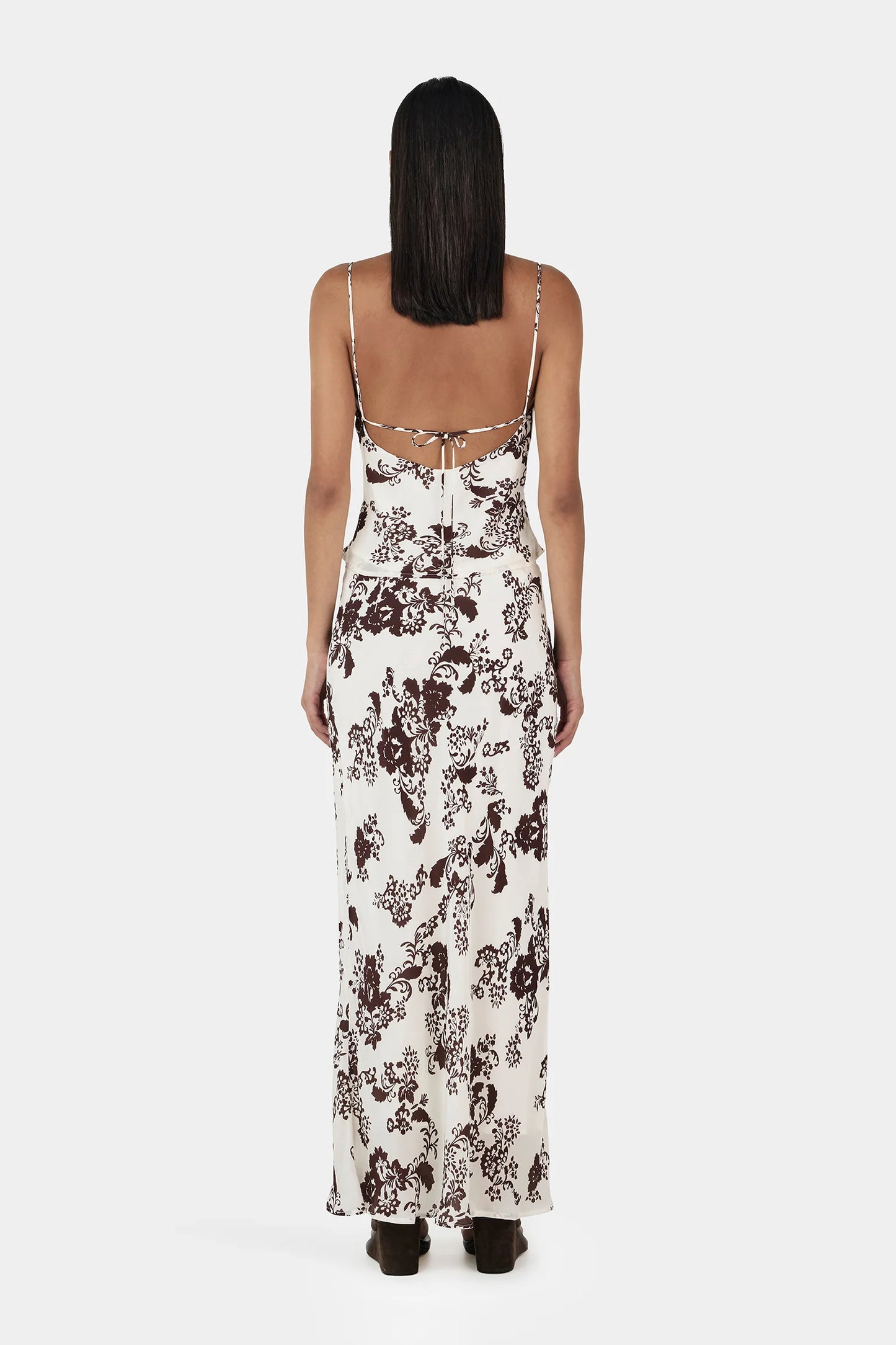 The Marli Cupro Slip Skirt is Ownley's newest everyday essential. Made in a lush silky cupro fabrication, the bias cut of the Marli beautifully skims the body while the elasticated scallop trim further refines the design. A timeless wardrobe staple, the Marli Slip Skirt will be your go-to.