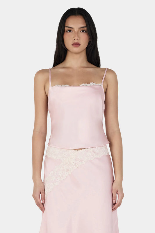 The Luna Cami is a bias-cut satin camisole with a cowl neckline and adjustable straps for the perfect fit. The Luna features delicate lace peeking through the front neckline, perfect for layering or wearing on its own. Pair with the matching Deja Midi Skirt for a complete set.
