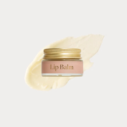 Transform your daily self-care ritual with our Australian-made natural Lip Balm. Thoughtfully crafted with premium hydrating ingredients including nourishing shea butter, antioxidant-rich sunflower and olive oils, and a hint of vanilla bean for a sweet touch. The sustainable glass packaging houses a gentle formula where pure beeswax and natural Vitamin E create a breathable moisture barrier that protects and soothes dry lips. Embrace this mindful moment of natural lip care that leaves your lips soft, health