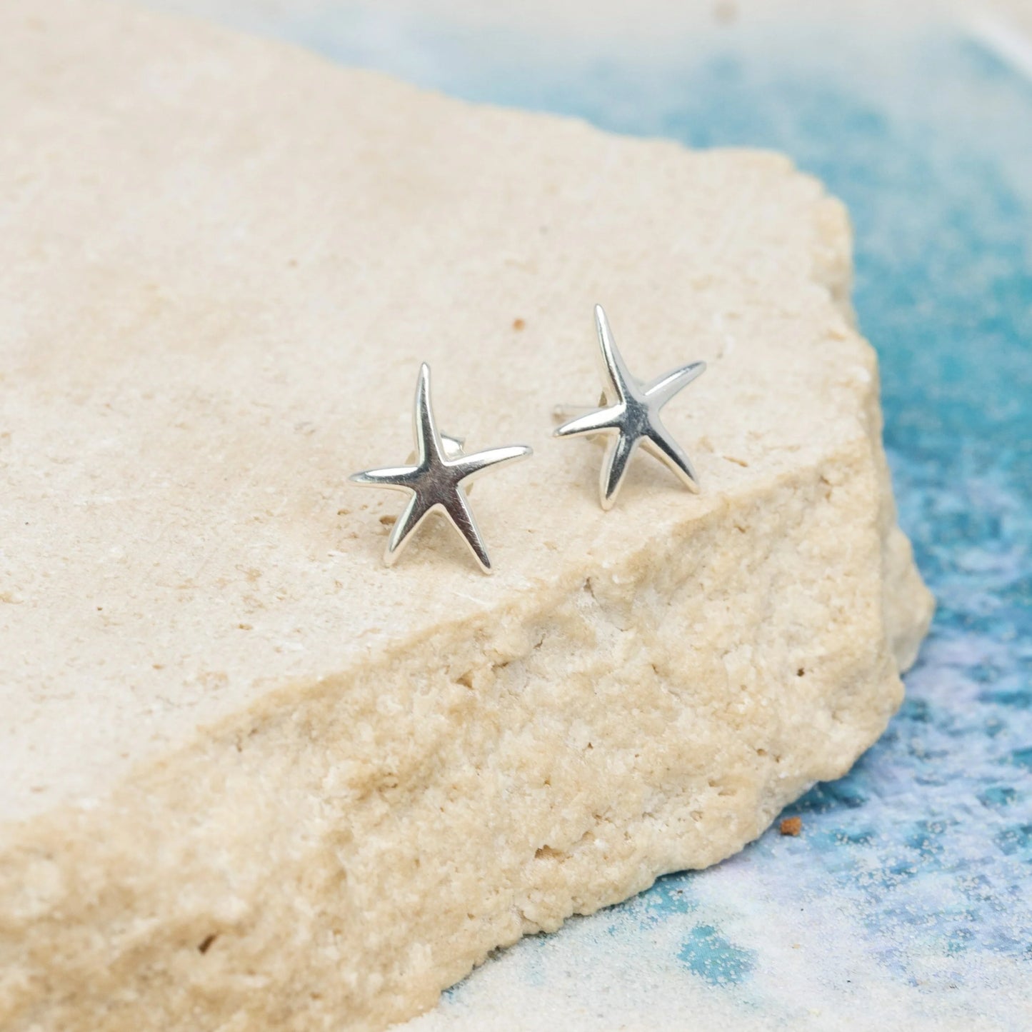 Embrace the enchantment of the sea with our Sea Star Studs. Crafted from sterling silver, these delicate studs feature intricate sea star designs. Perfect for everyday wear or special occasions, these studs add a touch of coastal allure to your style. Let the Sea Star Studs be a symbol of your connection to the ocean.