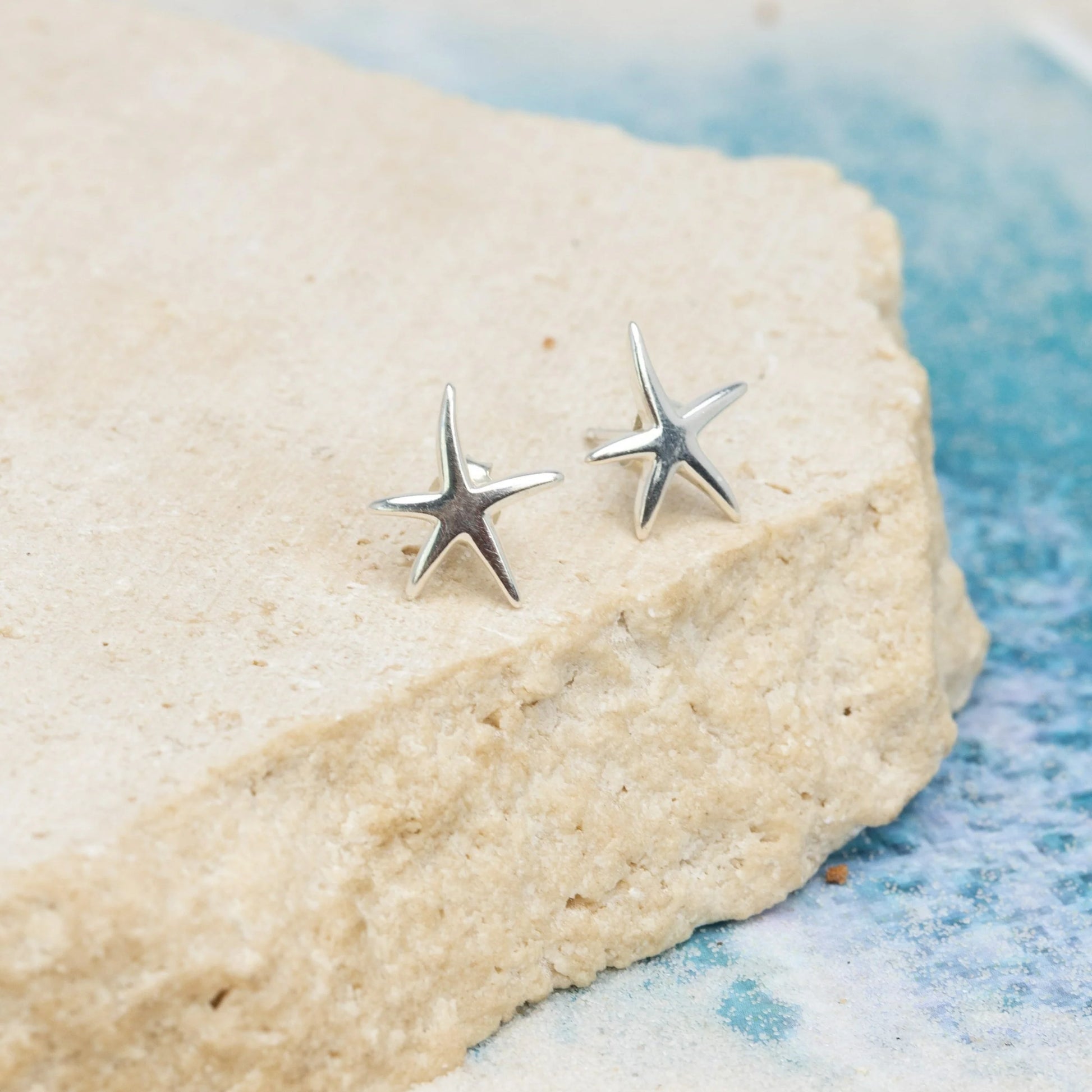 Embrace the enchantment of the sea with our Sea Star Studs. Crafted from sterling silver, these delicate studs feature intricate sea star designs. Perfect for everyday wear or special occasions, these studs add a touch of coastal allure to your style. Let the Sea Star Studs be a symbol of your connection to the ocean.