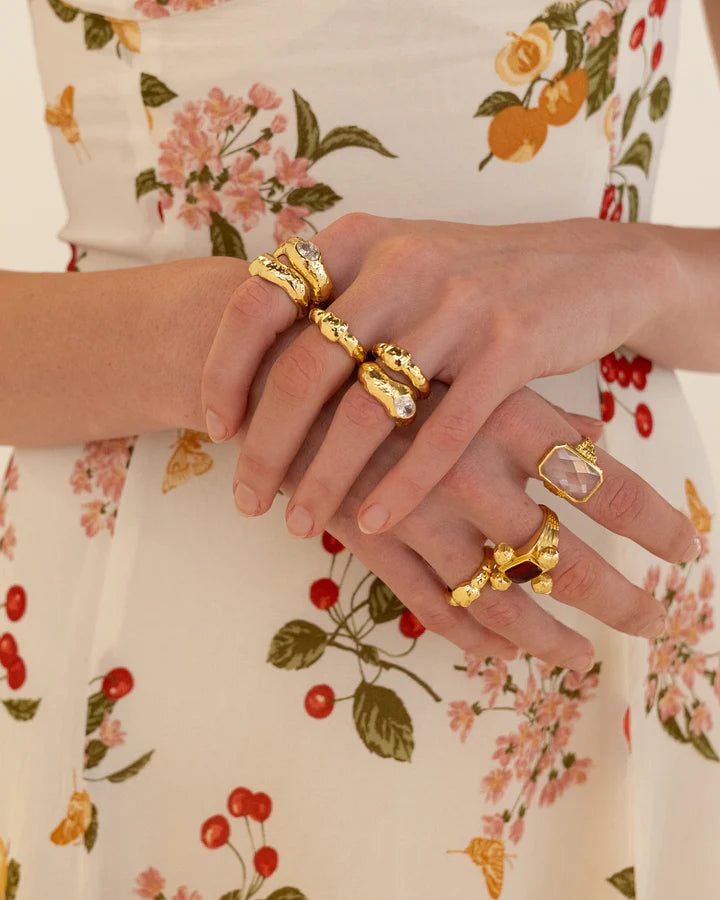 Introducing the Bleecker Ring, let's start by saying she is oh so chic and very cool! Boasting a chunky hammered texture band and a dazzling faceted White CZ in a seamless setting. The Bleecker Ring is fluid and more undone in comparison to our more structured cocktail ring styles which makes her an effortless styling accessory. The Bleecker has been designed to stack perfectly with the Billie Ring, though she is ever so striking all on her own. The Bleecker brings the edge without trying too hard...