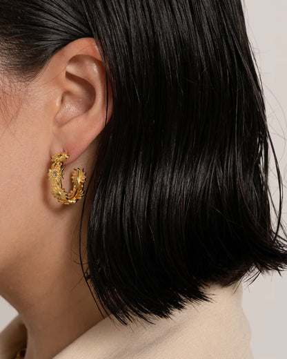 Cute, fun, fresh, floral, easy, breezy, beautiful! The Kareena earrings have become everyone's favourite little hoop to accessorise any outfit and bring some sunshine to every day. With glittering Citrine gemstones that capture the light and have you feeling your happiest. Every MM girl needs the Kareena's in their jewellery collection.&nbsp;