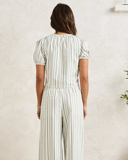 Rhythm brings together designers, artists, musicians, surfers and snowboarders with a shared dream of creating a livelihood doing what they love. Their range of tees, shorts, swimwear and casual staples speaks to surfers, skateboarders and snowboarders who still regard the art of riding as creative self-expression, who yearn for new frontiers over the well-worn path.