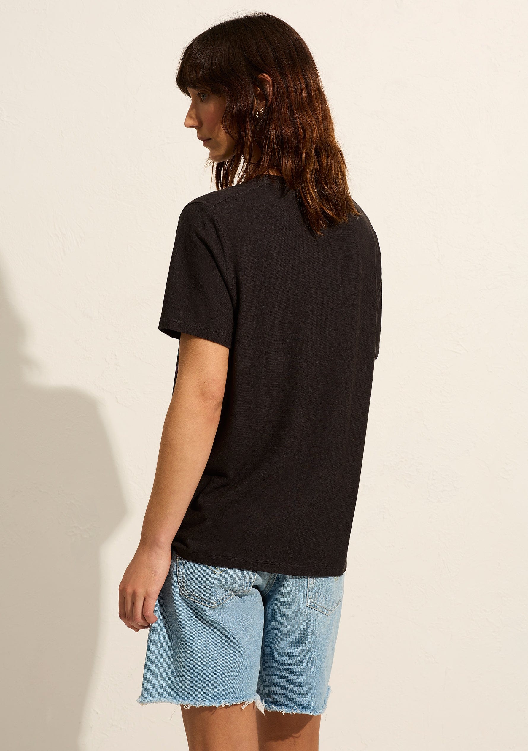 The Moonrider Classic Tee in black by Auguste the label is crafted from a soft, sustainable cotton blend. It features a crew neckline and a bold, graphic print on the front, designed by our talented team.

- Crew neckline
- Fits true to size; go with your usual
- 55% Hemp; 45% Organic Cotton
- Lightweight jersey with a soft hand feel
- Cold machine wash