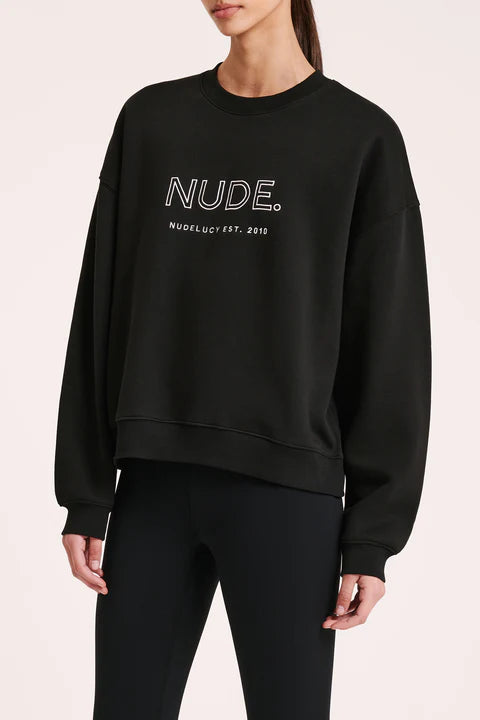 The Nude. Origins Sweat is made from our signature cotton blend fleece, washed down for a soft handfeel. The silhouette is regular relaxed fit with crew neckline and full length sleeves. Features include ribbing at the neckline, cuffs and hemline and exclusive embroidered Nude. emblem logo at chest.
