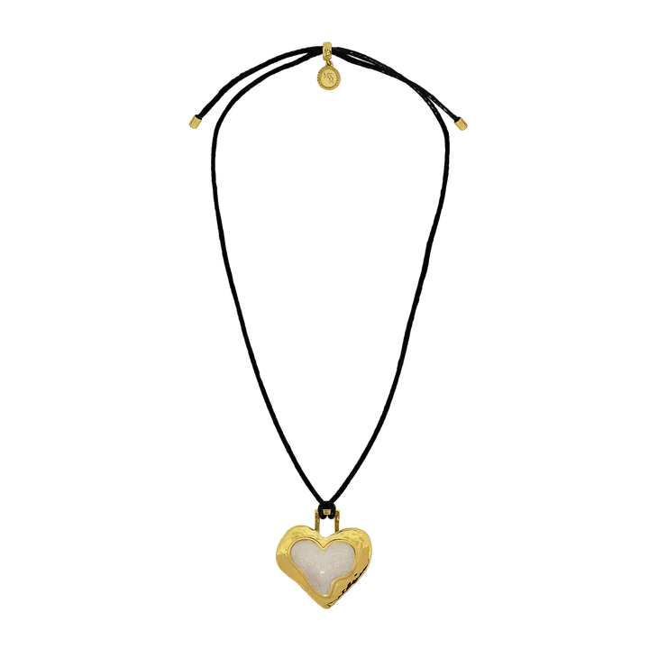 Bold, nostalgic, and steeped in symbolism, the Olympia Necklace reimagines a '90s classic through the lens of Greek antiquity. Featuring a heart-shaped pendant in molten gold and pearlescent enamel, suspended from a sleek black leather cord, Olympia strikes the perfect balance between retro edge and timeless romance.