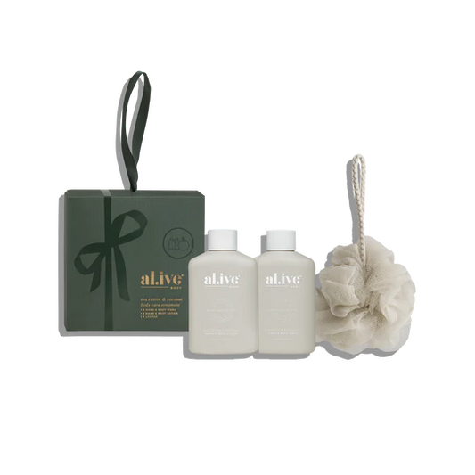 Our beloved Sea Cotton &amp; Coconut travel duo in charming bauble packaging with natural sponge included. Features Body Wash and Lotion perfect for holidays away - functional luxury that doubles as festive tree decoration.
