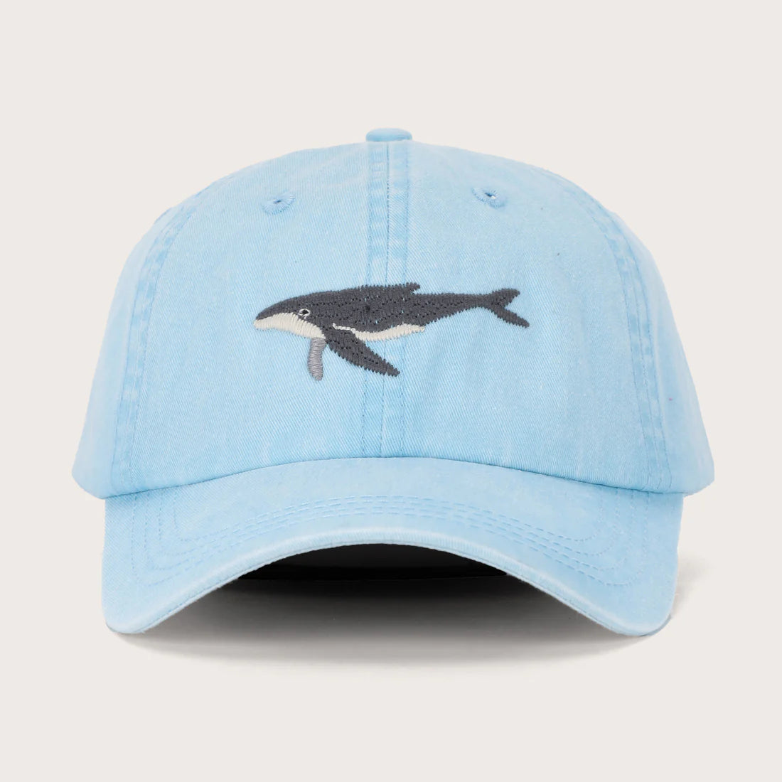 This light blue cap features an embroidered humpback whale (Megaptera novaeangliae), inspired by the gentle giants that migrate along the Australian coastline every year. Made from an ultra-soft cotton with faded look and feel, it is the ultimate hat for any ocean lover. Perfect for a sunny day at the beach, or whale watching from the boat, this killer cap is both fun and practical