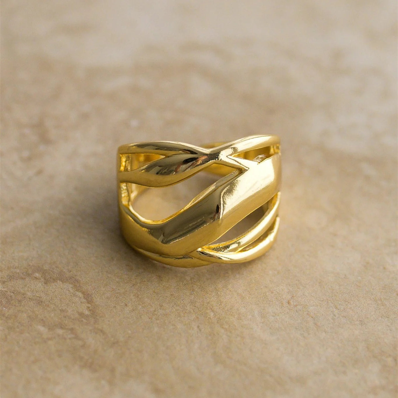 Add a touch of luxury to your accessories with the PARIS ring! This elegant piece features intricate detailing and a stunning gold hue, making it a perfect addition to any outfit.

18kt Gold Plated Stainless Steel
Hypoallergenic
Lead, Nickel &amp; Tarnish Free