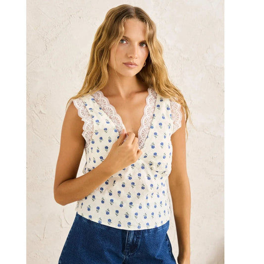 The Primrose Lace Top in Floral blends soft print with feminine lace trims. Featuring a V-neckline and cropped length, it's made to pair back with your favourite denim or skirt.