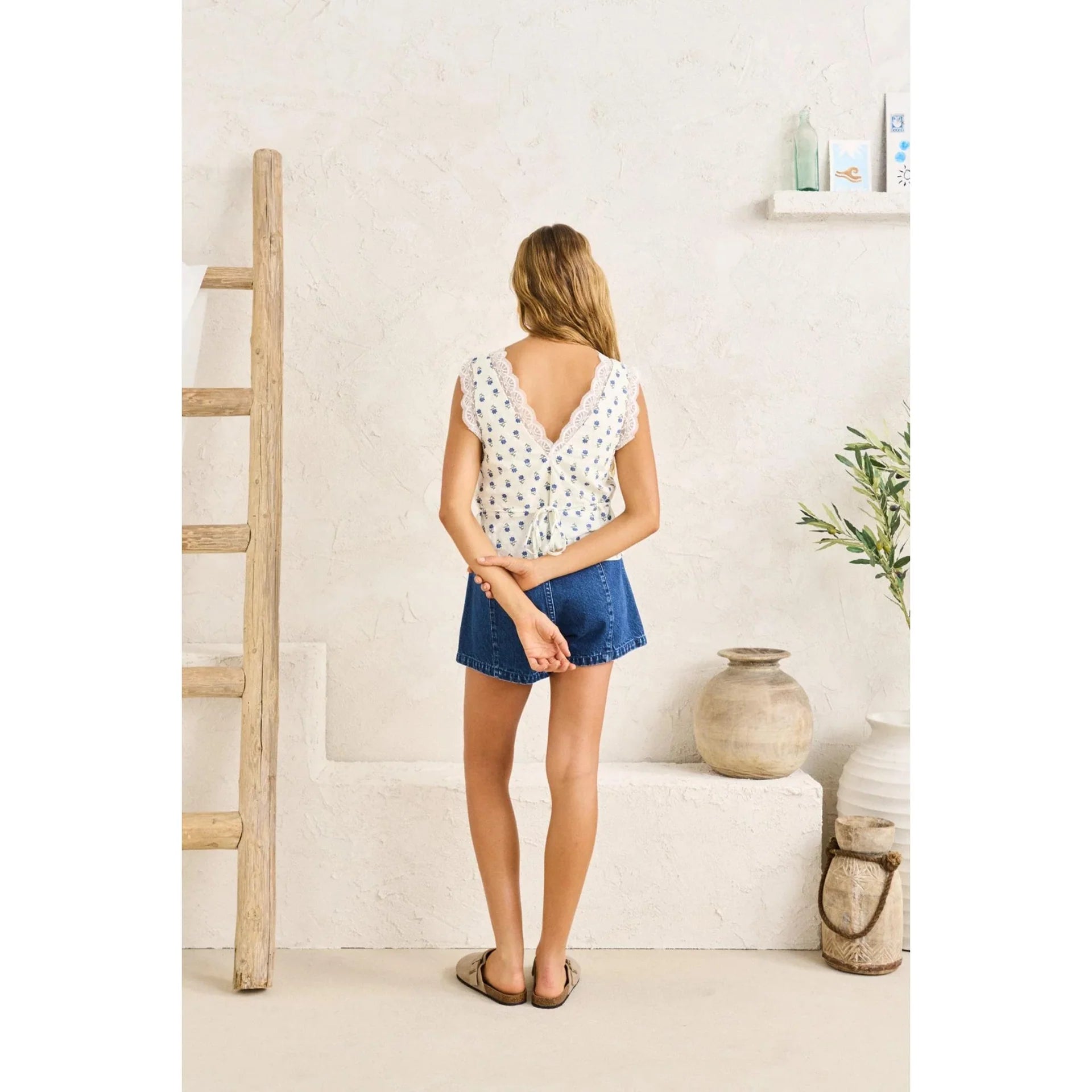 The Primrose Lace Top in Floral blends soft print with feminine lace trims. Featuring a V-neckline and cropped length, it's made to pair back with your favourite denim or skirt.