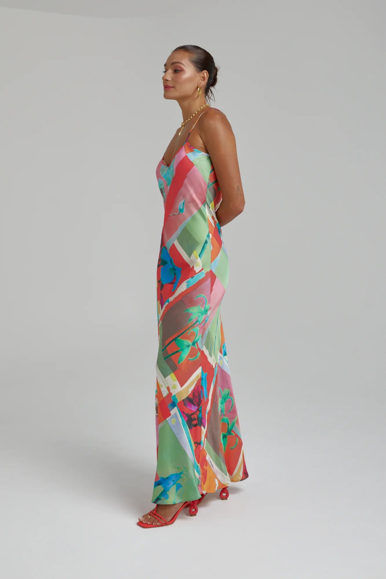 The infamous Siren Dress featuring the Royal Montage print. Constructed from smooth viscose for a laid-back yet flattering silhouette.