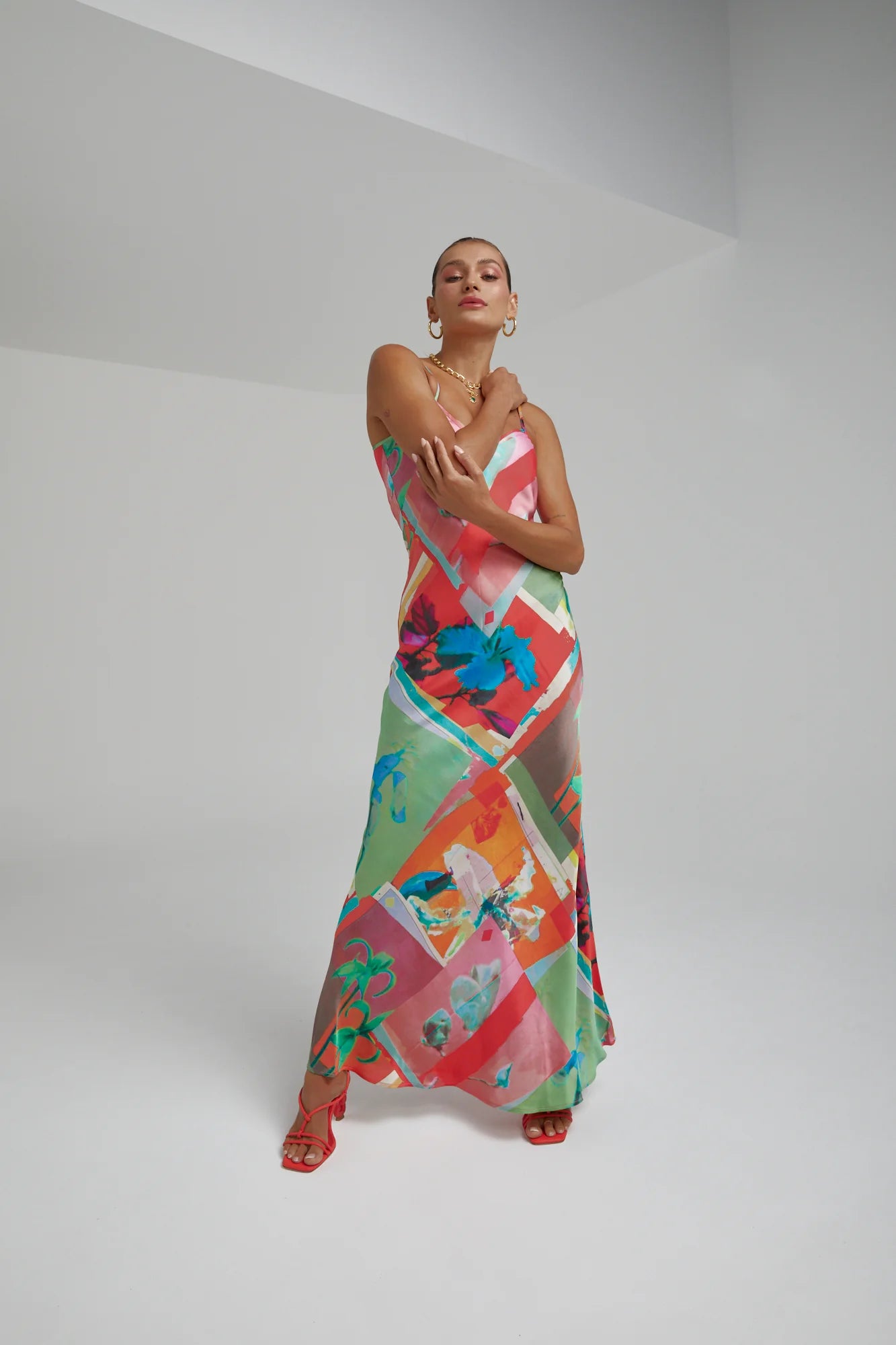 The infamous Siren Dress featuring the Royal Montage print. Constructed from smooth viscose for a laid-back yet flattering silhouette.