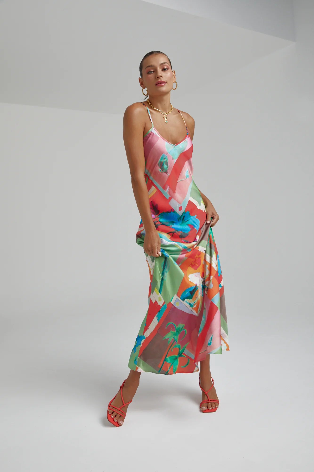 The infamous Siren Dress featuring the Royal Montage print. Constructed from smooth viscose for a laid-back yet flattering silhouette.