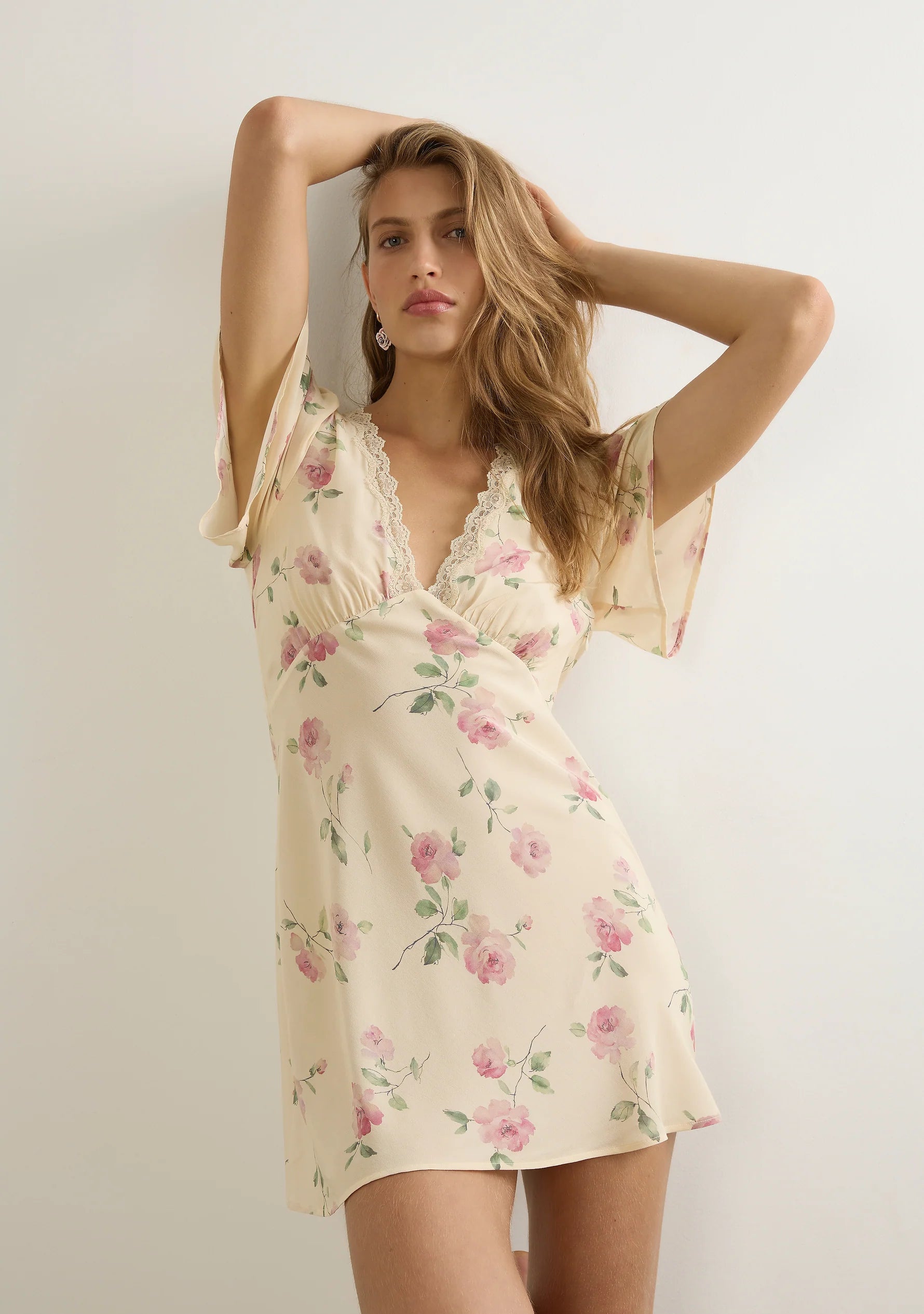 A brand-new silhouette ready for summer—the Sadie Mini Dress in the soft and feminine Nova floral. Featuring a delicate V-neckline with lace trim, a flattering under-bust seam with soft gathers, and a bias-cut silhouette that skims the body beautifully. Short flutter sleeves add a romantic touch, while an invisible side zip ensures a seamless fit. Crafted from a lightweight rayon-viscose blend with a soft drape. Fits true to size. Cold hand wash recommended.