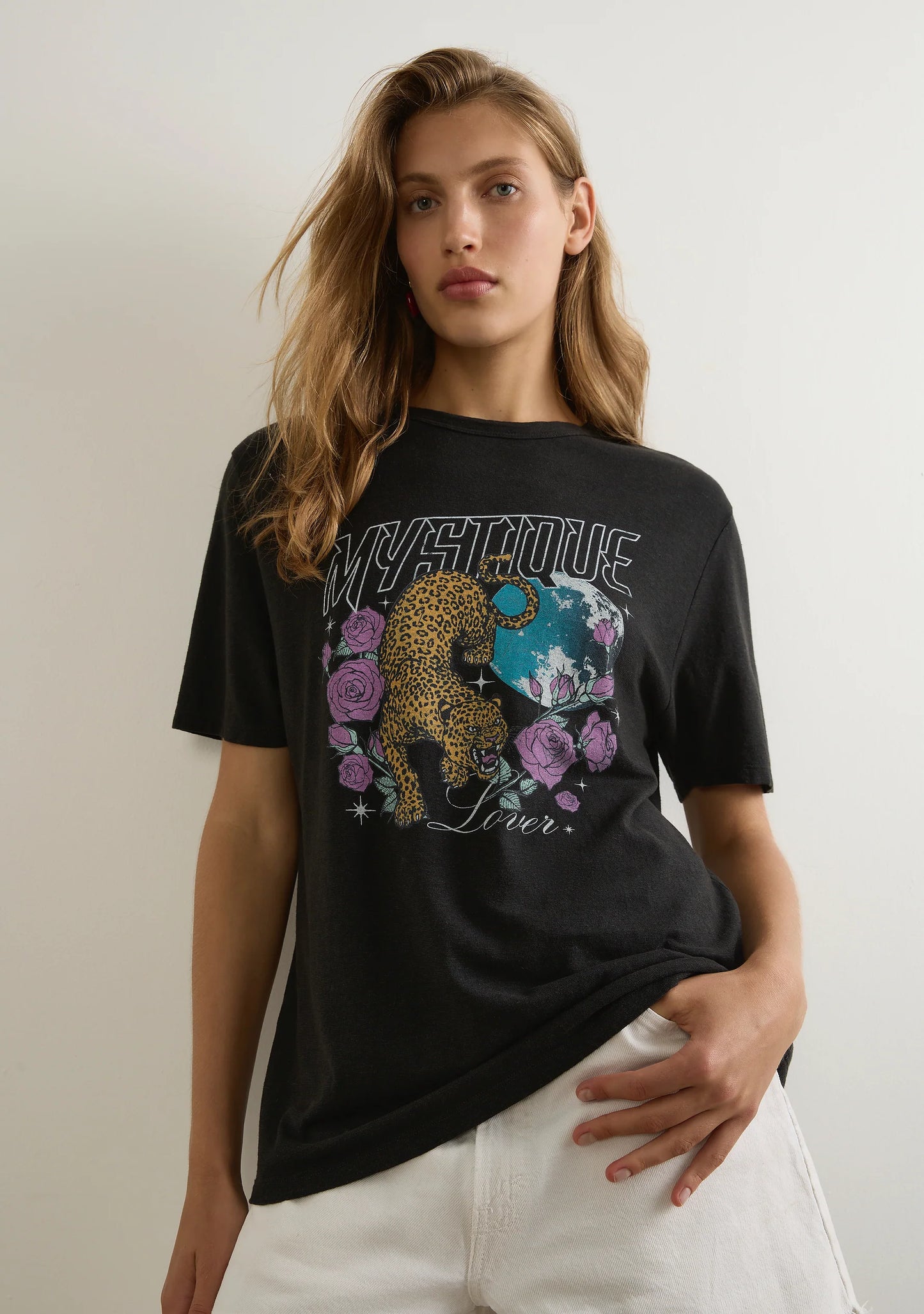 The Mystique Classic Tee in black is an effortless staple designed for everyday wear. Featuring a classic crew neckline and a true-to-size fit, this tee is crafted from a sustainable blend of 55% hemp and 45% organic cotton, offering a lightweight jersey fabric with a soft hand feel. A versatile essential with a luxe yet laid-back appeal, it pairs effortlessly with your favorite denim or floaty skirts. Cold machine wash recommended.