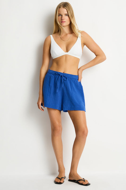 The ultimate wear-anywhere look for beachside cool and beyond. A perfect piece to layer over your favourite swim, or in mix-and-match colours for polished resort chic.

Cotton cheesecloth fabric

Side pockets

Drawstring cord &amp; elastic waist
High waisted&nbsp;mid length short

Fabric Composition:
100% Cotton