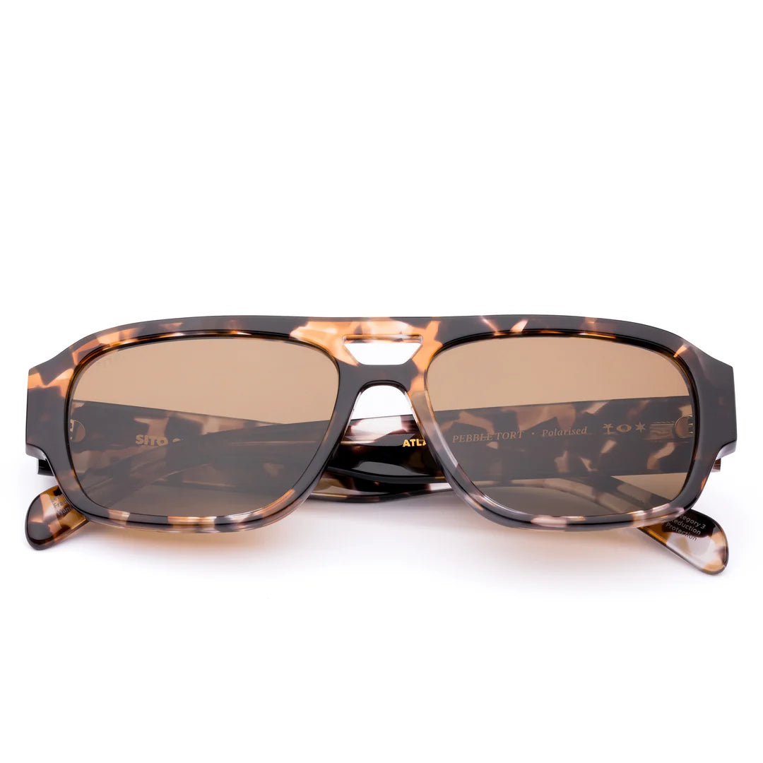 Wear your ticket to roam from sunrise to&nbsp;somewhere, no itinerary required. The Atlas Pebble Tort&nbsp;pairs bold confidence with a lightweight aviator&nbsp;frame that brings that anywhere energy: part&nbsp;jet-set, part road trip, all effortless cool. Crafted&nbsp;from durable yet lightweight eco acetate,&nbsp;with high-quality polarised UV lenses to keep your eyes&nbsp;covered from sunrise to somewhere.&nbsp; Designed in Australia, Atlas is ready for whatever’s next,&nbsp;no itinerary needed. Feels li