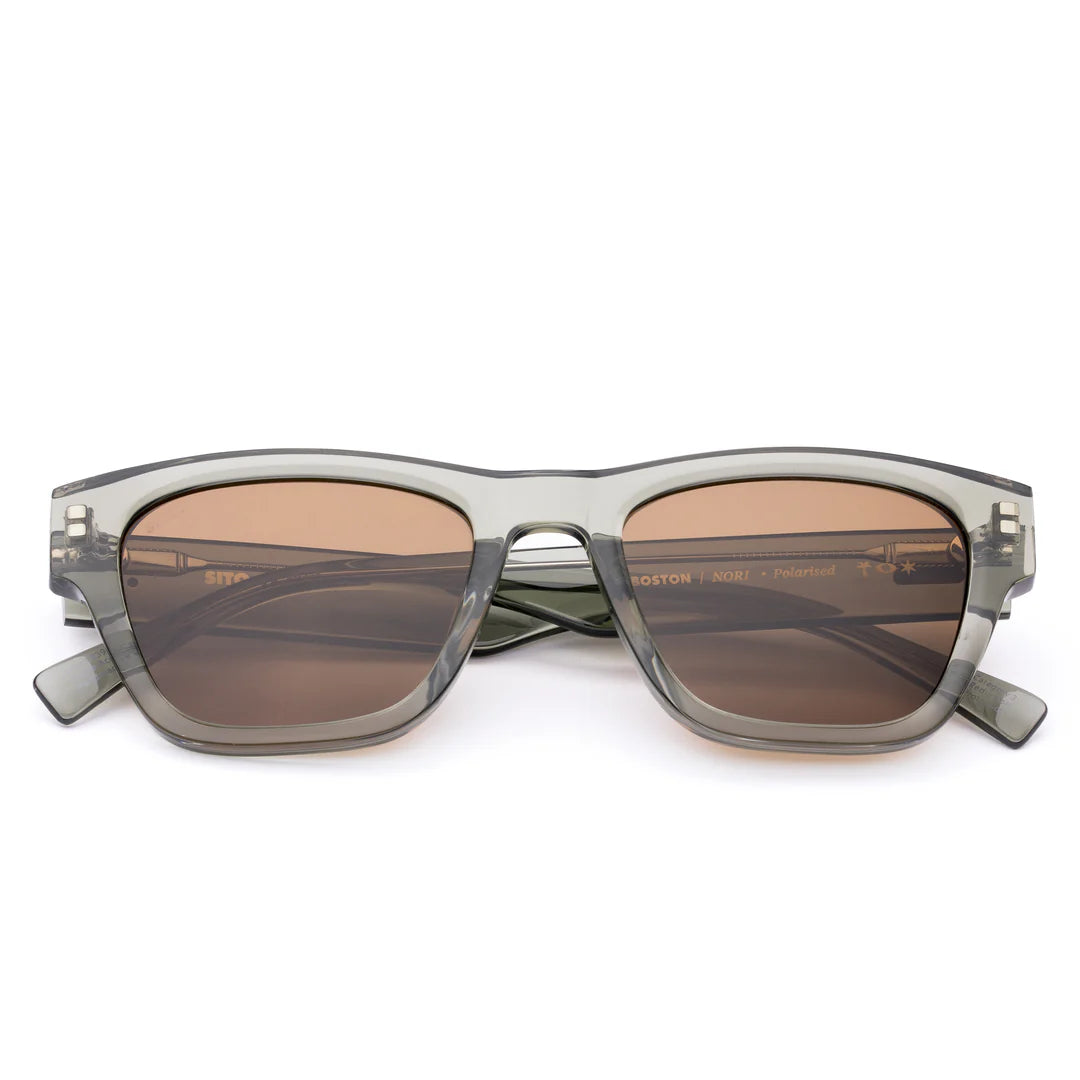 Step out in confidence with the Boston Nori Polarised Wayfarer by&nbsp;Sito Shades. This larger-fit frame peeks effortlessly from beneath a hoodie or pairs seamlessly with city-ready outfits. Designed to complement a variety of face shapes, the Boston in Nori green combines style, comfort, and performance with premium polarised lenses for ultimate UV protection. Designed in Australia, it’s the eyewear that makes every urban adventure feel cinematic.

Lens Colour:&nbsp;Brown Polarised