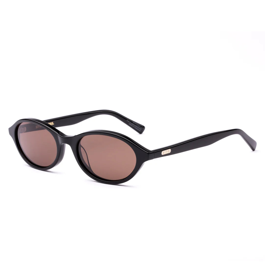 Cool, calm and confident in the most understated way, Orion in Black is the frame that goes with everything and outlasts every trend. Its softly rounded oval shape offers a universally flattering fit, giving effortless balance to any look — whether it’s jeans and a tee or your go-to summer dress. Handcrafted from plant-based acetate in a deep black and fitted with premium coffee tinted UV-protective lenses, Orion is equal parts timeless and sustainable. Designed in Australia for the woman who moves easily b