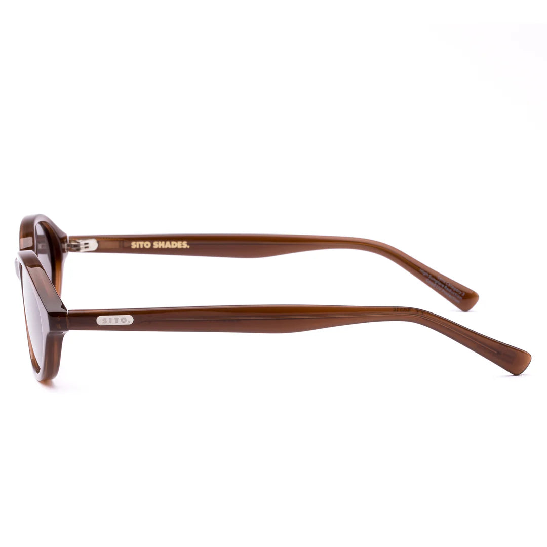 Cool, calm and confident in the most understated way, Orion in Black is the frame that goes with everything and outlasts every trend. Its softly rounded oval shape offers a universally flattering fit, giving effortless balance to any look — whether it’s jeans and a tee or your go-to summer dress. Handcrafted from plant-based acetate in a deep black and fitted with premium coffee tinted UV-protective lenses, Orion is equal parts timeless and sustainable. Designed in Australia for the woman who moves easily b