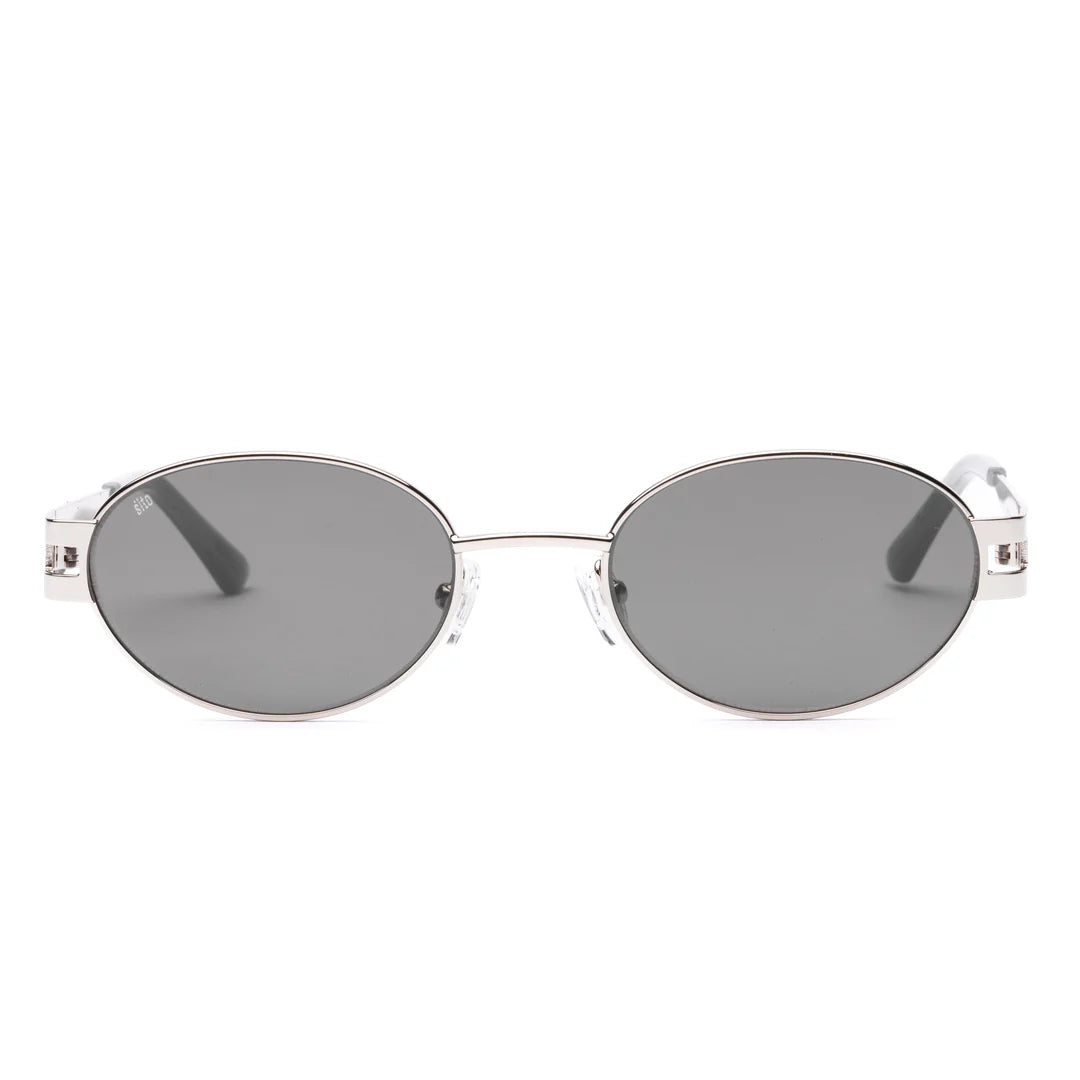 Style with Stevie. A stylish blend of nostalgic charm and contemporary sophistication. Taking inspiration from the iconic '90s, these sunglasses feature a sleek oval shape with carefully tapered temples that add a refined touch to any look. Crafted with a modern metal frame with a milky sage coloured plant based acetate detailing, the Stevie sunglasses are the ultimate accessory to elevate your ensemble, whether you're lounging by the beach or dressing up for an event.

Designed in Australia.