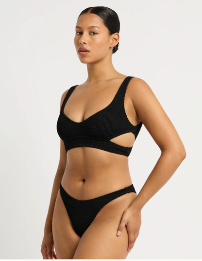 Classic mid coverage brief Thin sides for minimal tan lines Can be worn low, mid or high on hip. Scene Brief by Bond-Eye Swim.